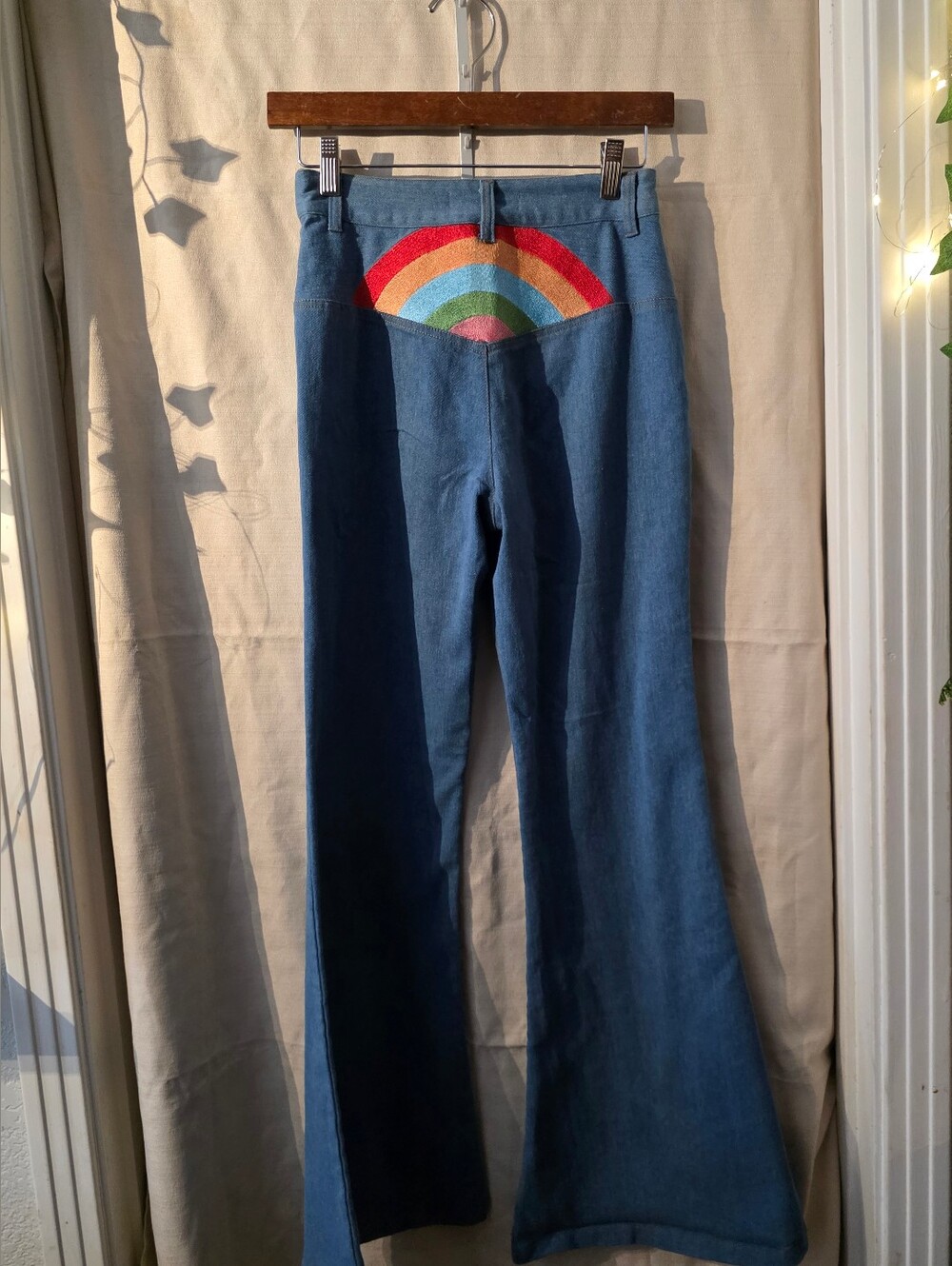 70s High-Rise Blue Flared Jeans with Rainbow Back Detail